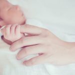 Soft focus and blurry of Baby Hands, vintage style color effect